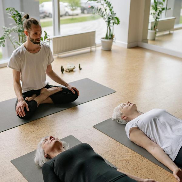 A serene setting with yoga mats ready for a class.